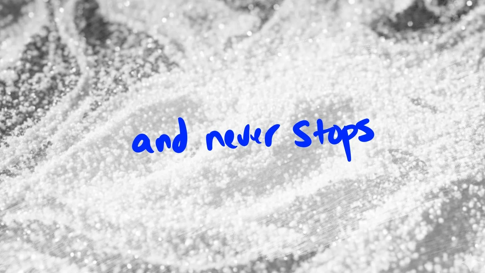 Storyboard frame with and never stops handwritten text over macro close-up of frac sand particles by Motion Giraffx