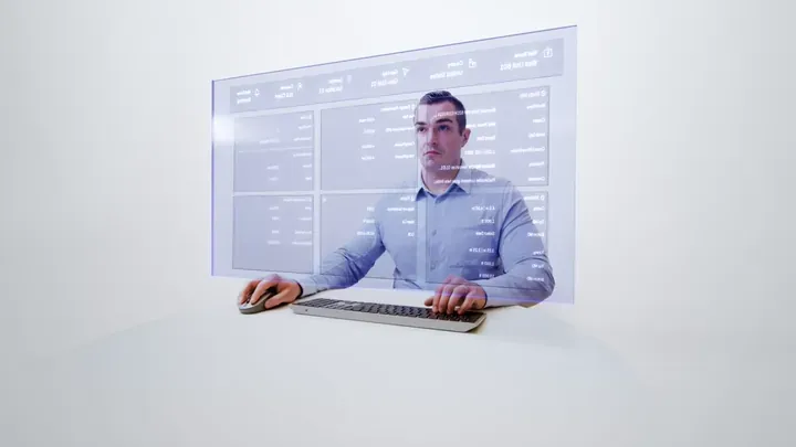 SLB engineer with digital planning interface overlay working at monitoring workstation by Motion Giraffx