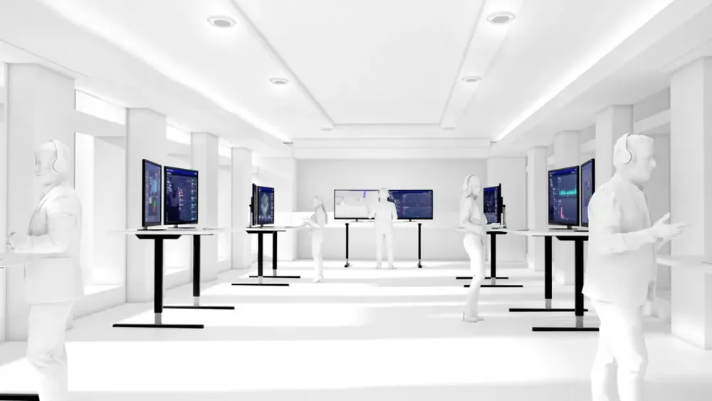 Operators in a white control room monitoring pipeline data on multiple standing workstation screens.