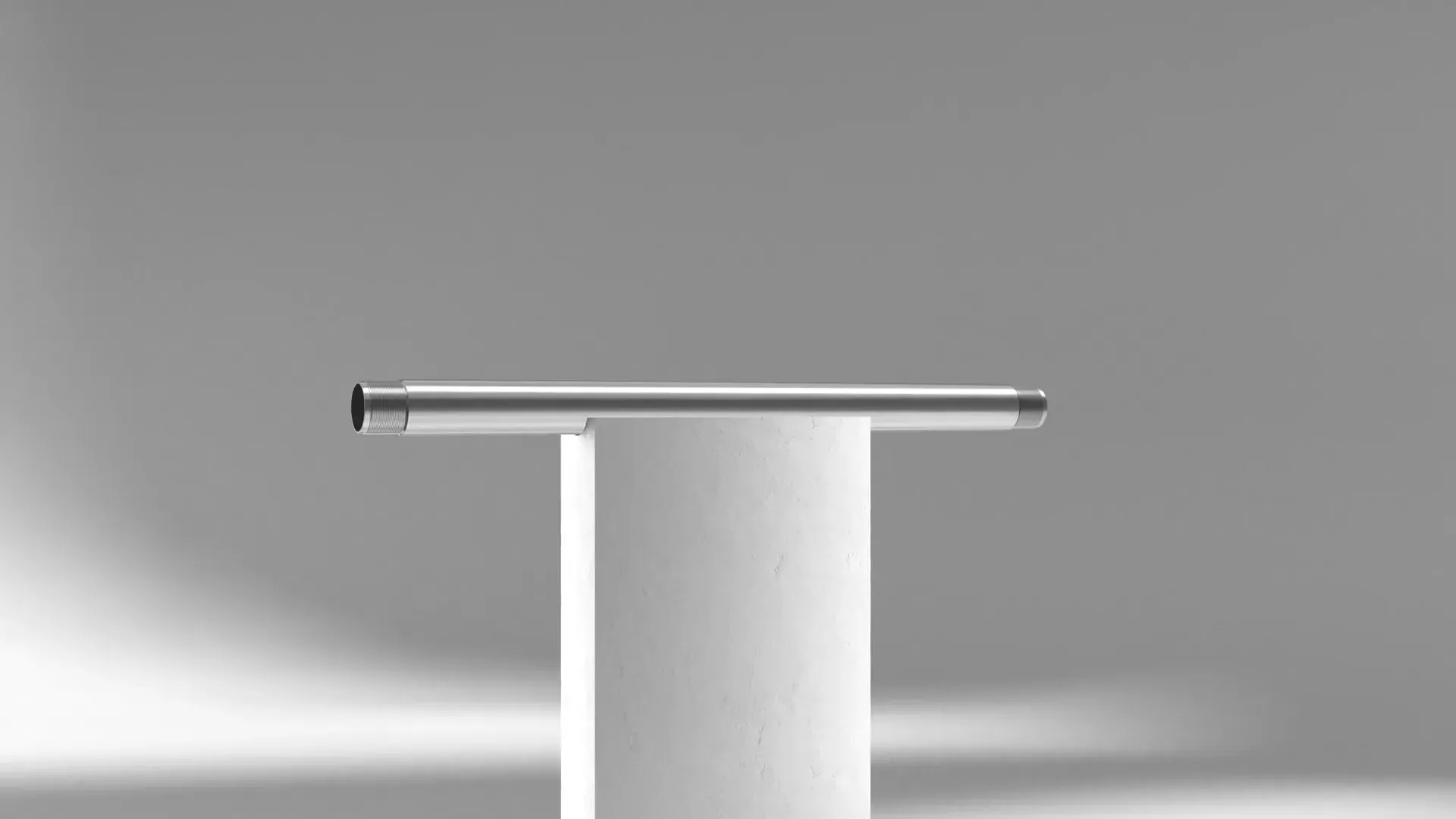 Metal pipe resting on a white pedestal against a gray backdrop, from the SLB Deka 3D animation by Motion Giraffx