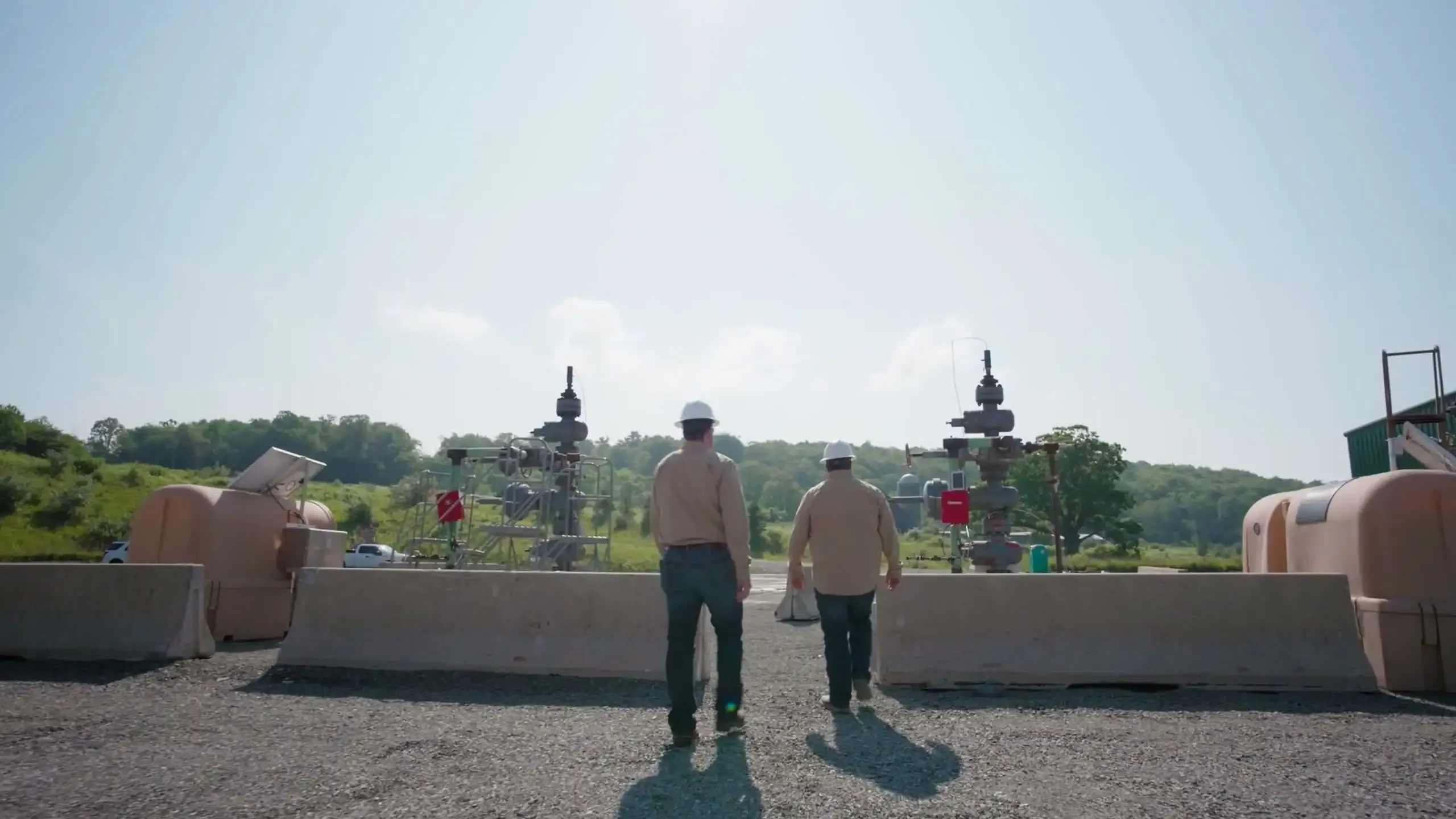 A shot from the SWN video showing a construction workers moving through the site.