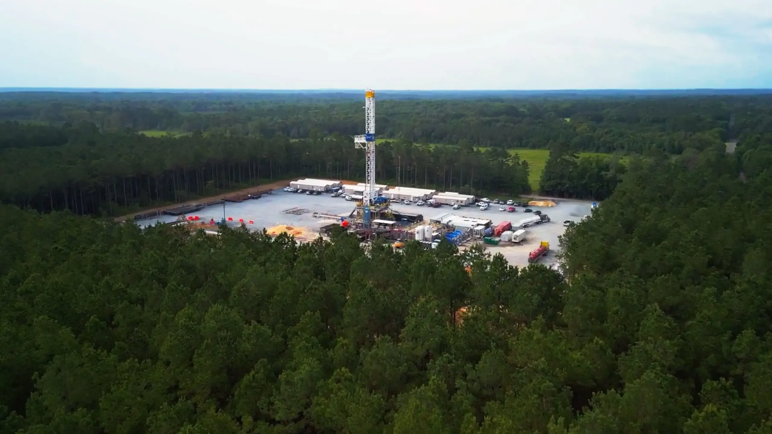 Aerial shot from the SWN video showing the work site with a forest around it.